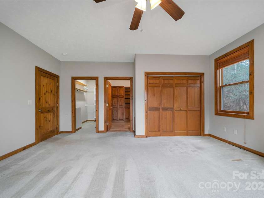 42 Tsitsi Court, Brevard, NC 28712.  MLS# CAR4326496, YatesRealty ID 2641. Primary bedroom