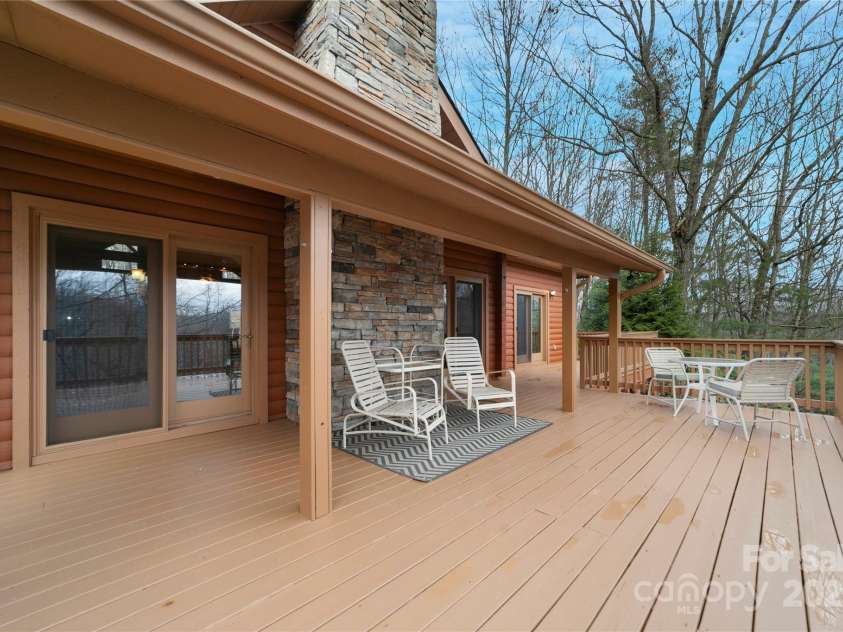 42 Tsitsi Court, Brevard, NC 28712.  MLS# CAR4326496, YatesRealty ID 2641. Spacious decks for entertaining