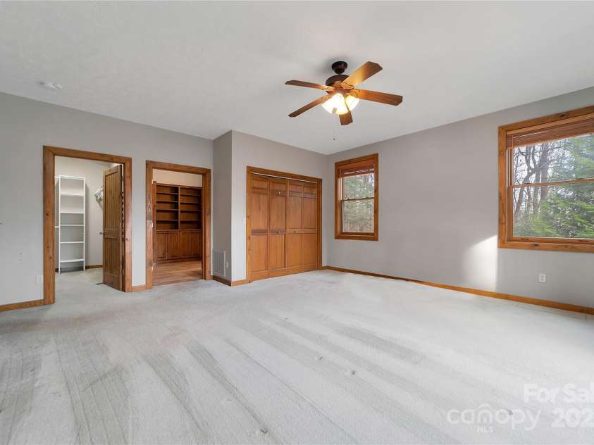42 Tsitsi Court, Brevard, NC 28712.  MLS# CAR4326496, YatesRealty ID 2641. Spacious Primary bedroom