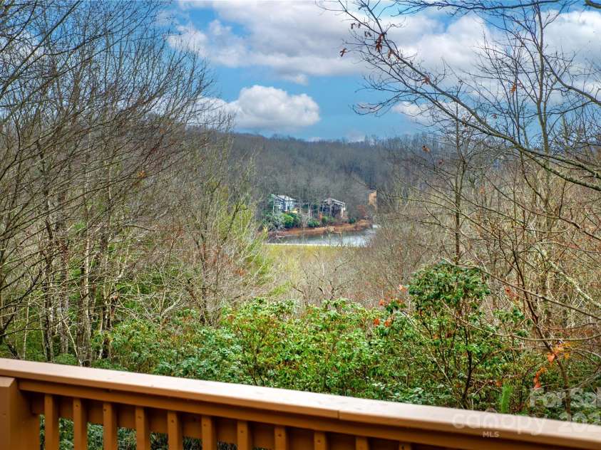 42 Tsitsi Court, Brevard, NC 28712.  MLS# CAR4326496, YatesRealty ID 2641. View of Lake Atagahi