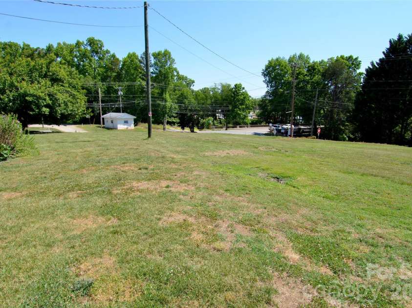 1419 US 70 Highway, Valdese, NC 28690.  MLS# CAR4381652, YatesRealty ID 26417. Side Yard
