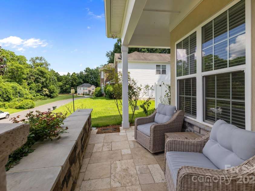 2117 Middlebridge Court, Fort Mill, SC 29715.  MLS# CAR4270419, YatesRealty ID 2642. Beautiful views of neighborhood from front porch.