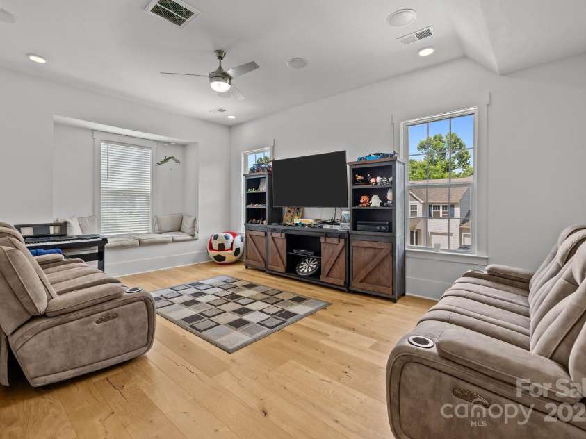 2117 Middlebridge Court, Fort Mill, SC 29715.  MLS# CAR4270419, YatesRealty ID 2642. Front theater room on main level