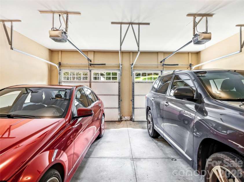 61 Village Pointe Lane, Asheville, NC 28803.  MLS# CAR4367840, YatesRealty ID 26421. Two Car garage with easy access to kitchen