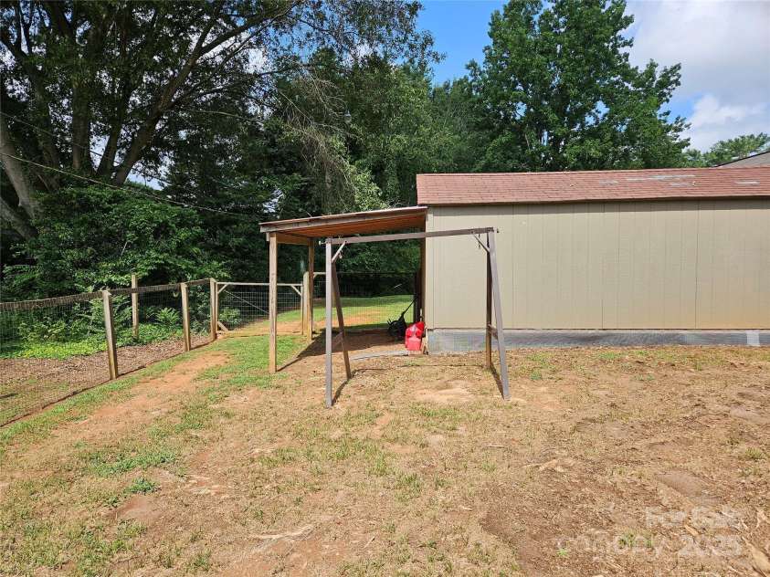 818 Laurel Street, Lincolnton, NC 28092.  MLS# CAR4282126, YatesRealty ID 26424. Back of utility has cover and electrical outlet