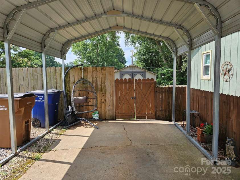 818 Laurel Street, Lincolnton, NC 28092.  MLS# CAR4282126, YatesRealty ID 26424. Carport
