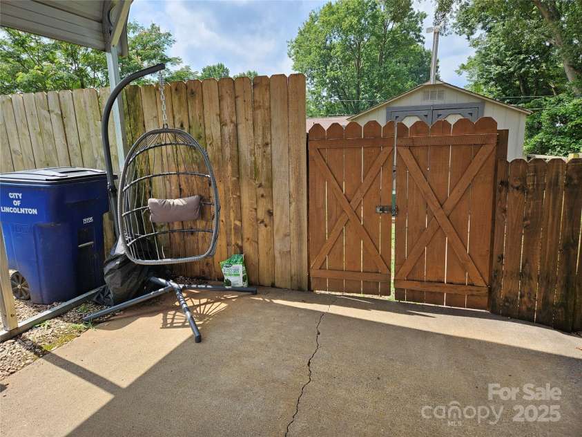 818 Laurel Street, Lincolnton, NC 28092.  MLS# CAR4282126, YatesRealty ID 26424. Privacy fencing
