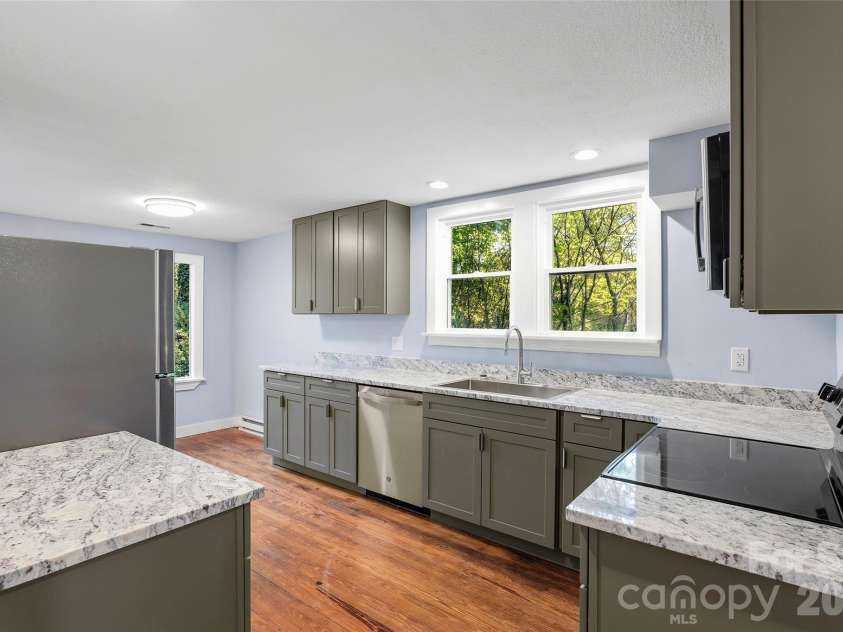 112 Candler School Road, Candler, NC 28715.  MLS# CAR4361613, YatesRealty ID 26429. 
