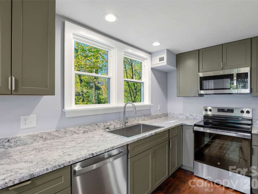 112 Candler School Road, Candler, NC 28715.  MLS# CAR4361613, YatesRealty ID 26429. 