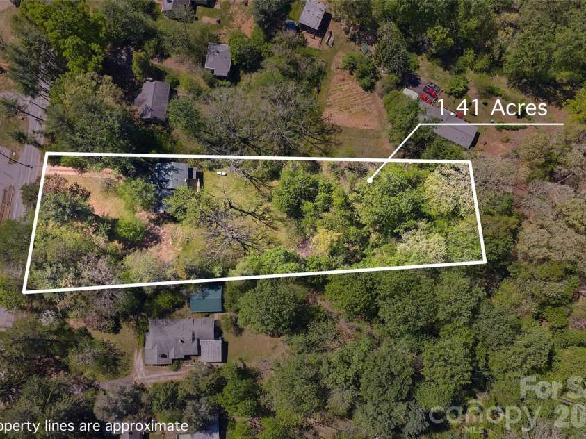 112 Candler School Road, Candler, NC 28715.  MLS# CAR4361613, YatesRealty ID 26429. 