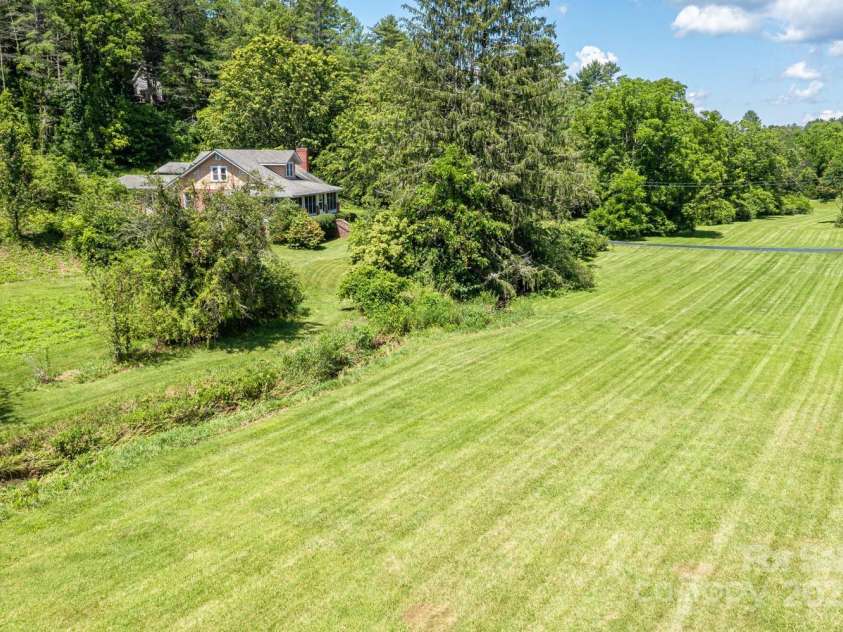 160 Mclean Road, Weaverville, NC 28787.  MLS# CAR4277668, YatesRealty ID 26429. Lower Pasture and Creek