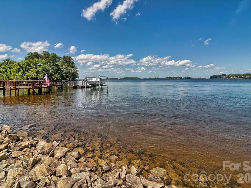 1252 Morning Shore Drive, Lexington, SC 29072.  MLS# CAR4313174, YatesRealty ID 2643. 215' of added Rip Rap. Dock and Lift 