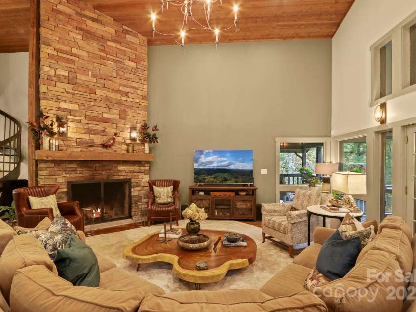 198 Little Harbour None, Vilas, NC 28692.  MLS# CAR4304013, YatesRealty ID 2643. Grand stone fireplace to warm up the space!