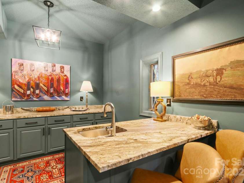 198 Little Harbour None, Vilas, NC 28692.  MLS# CAR4304013, YatesRealty ID 2643. Lower-level living wet bar