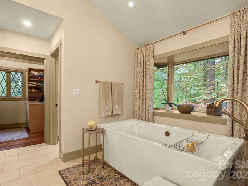 198 Little Harbour None, Vilas, NC 28692.  MLS# CAR4304013, YatesRealty ID 2643. Main-level primary suite