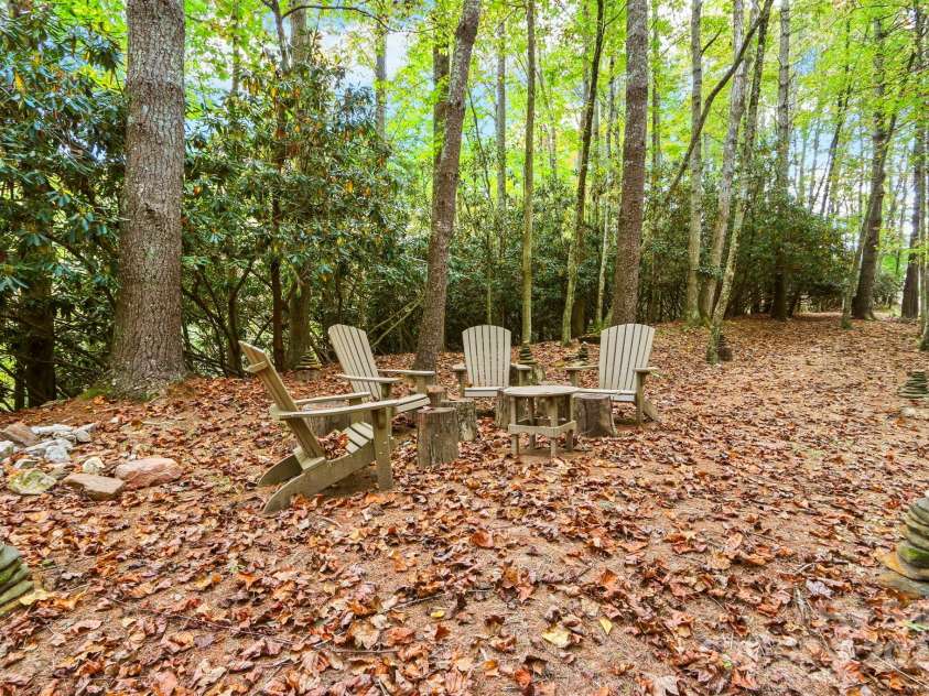 198 Little Harbour None, Vilas, NC 28692.  MLS# CAR4304013, YatesRealty ID 2643. Trail from the home to sitting area 'in the woods'!