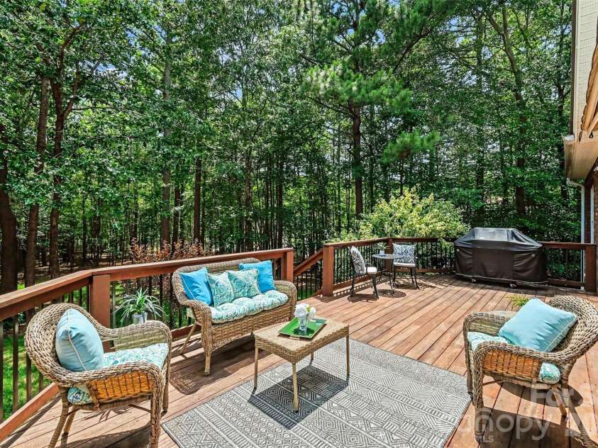 1233 Silver Arrow Court, Fort Mill, SC 29715.  MLS# CAR4386403, YatesRealty ID 26430. Deck overlooking the back yard