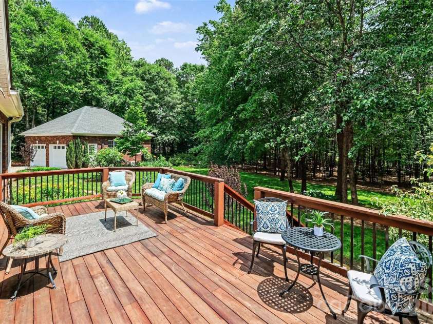 1233 Silver Arrow Court, Fort Mill, SC 29715.  MLS# CAR4386403, YatesRealty ID 26430. Deck overlooking the back yard