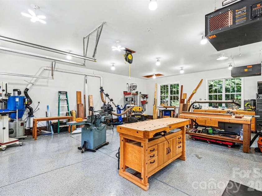 1233 Silver Arrow Court, Fort Mill, SC 29715.  MLS# CAR4386403, YatesRealty ID 26430. Fully finished and conditioned workshop