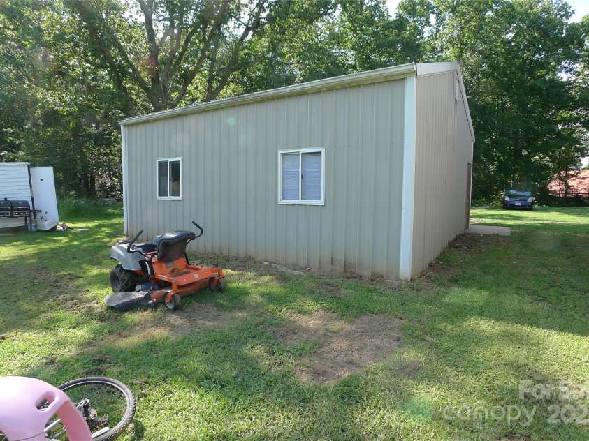 145 Abigail Trail, Ararat, NC 27007.  MLS# CAR4282506, YatesRealty ID 26432. Back of garage