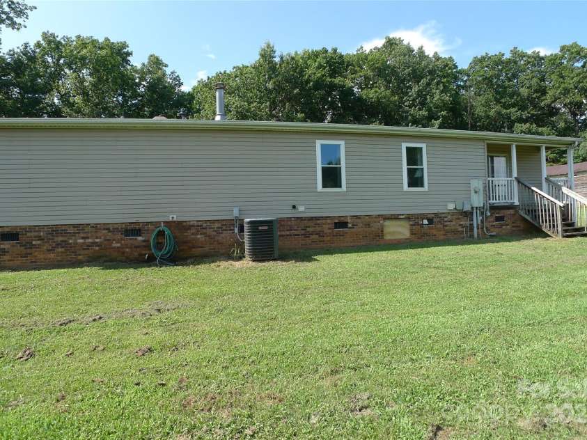 145 Abigail Trail, Ararat, NC 27007.  MLS# CAR4282506, YatesRealty ID 26432. Back of house