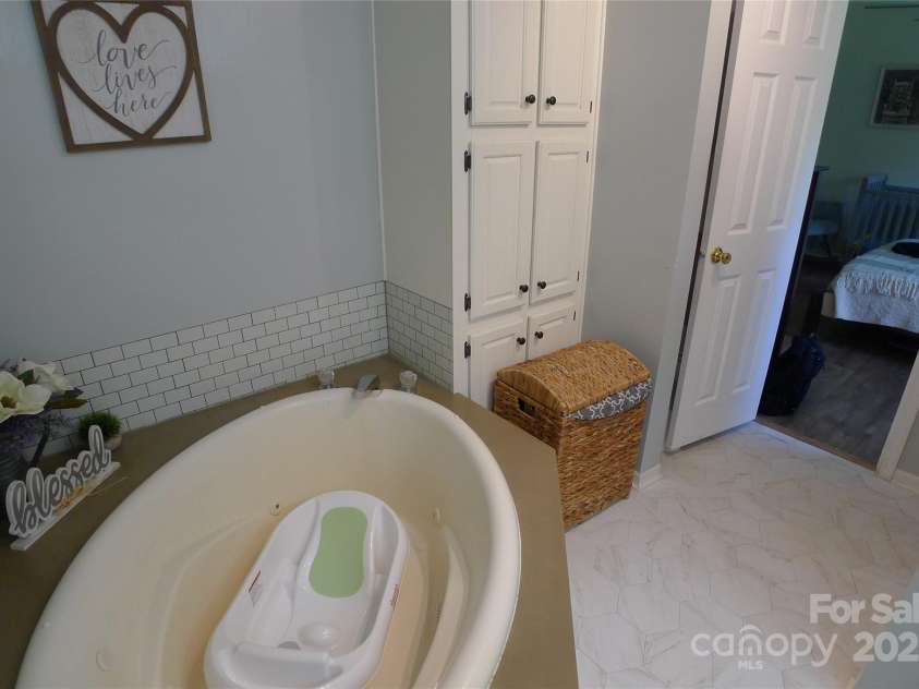 145 Abigail Trail, Ararat, NC 27007.  MLS# CAR4282506, YatesRealty ID 26432. Primary bathroom