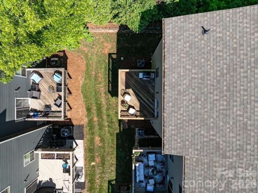 1641 Bark Branch Lane, Charlotte, NC 28205.  MLS# CAR4378680, YatesRealty ID 26433. End unit offering added privacy