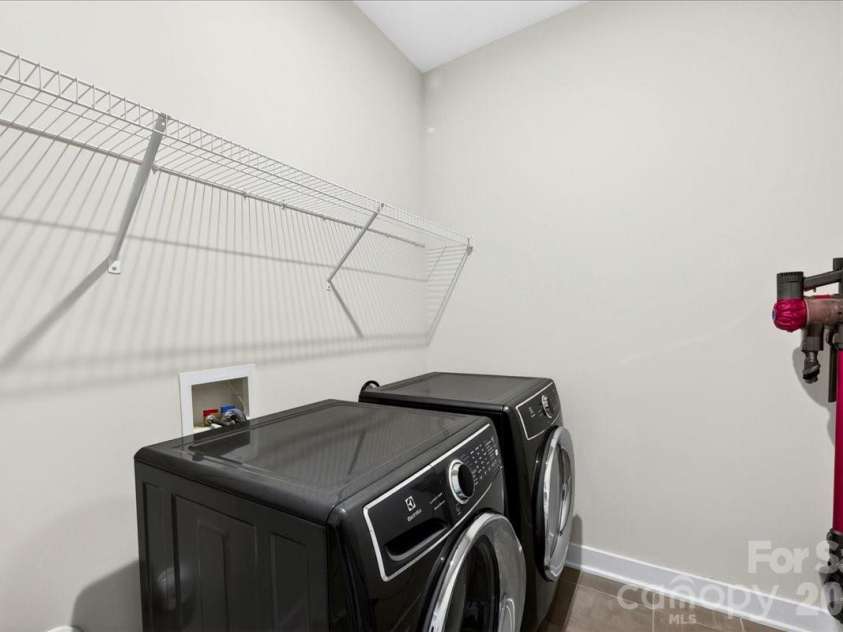 1641 Bark Branch Lane, Charlotte, NC 28205.  MLS# CAR4378680, YatesRealty ID 26433. Upper Level - Laundry Room