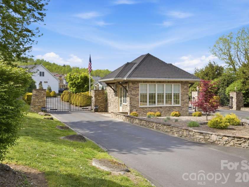 82 Blacksmith Run Drive, Hendersonville, NC 28792.  MLS# CAR4363924, YatesRealty ID 26434. Gated Entry!