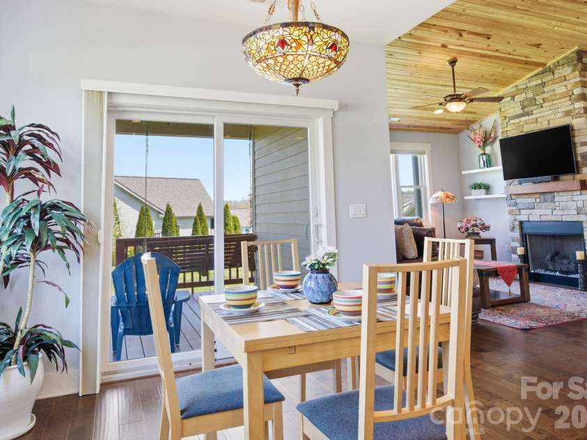 82 Blacksmith Run Drive, Hendersonville, NC 28792.  MLS# CAR4363924, YatesRealty ID 26434. Kitchen and Dining Room open to Covered Deck!