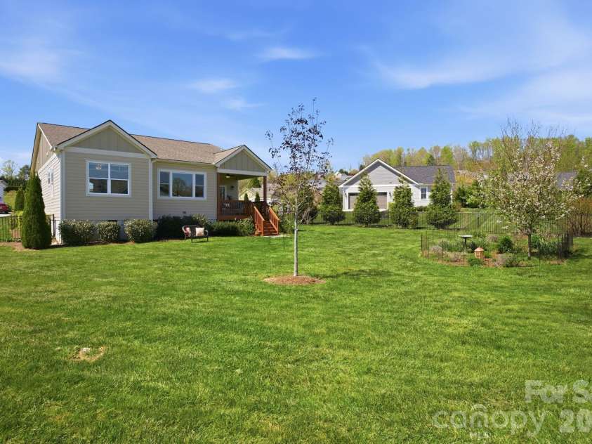 82 Blacksmith Run Drive, Hendersonville, NC 28792.  MLS# CAR4363924, YatesRealty ID 26434. Spacious back yard, fully fenced!!