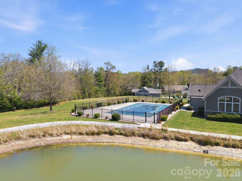 82 Blacksmith Run Drive, Hendersonville, NC 28792.  MLS# CAR4363924, YatesRealty ID 26434. Swimming Pool and Pond with walking trail!