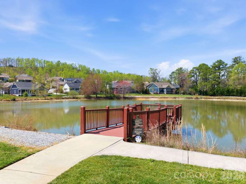 82 Blacksmith Run Drive, Hendersonville, NC 28792.  MLS# CAR4363924, YatesRealty ID 26434. Walking Trail and Dock!
