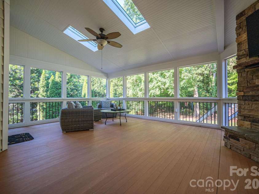 20131 Tailwind Lane, Cornelius, NC 28031.  MLS# CAR4381128, YatesRealty ID 26441. Abundant space on Covered screened porch
