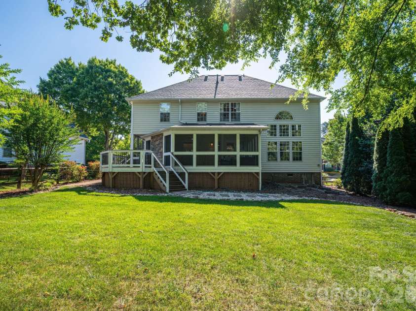 20131 Tailwind Lane, Cornelius, NC 28031.  MLS# CAR4381128, YatesRealty ID 26441. Great backyard with storage shed