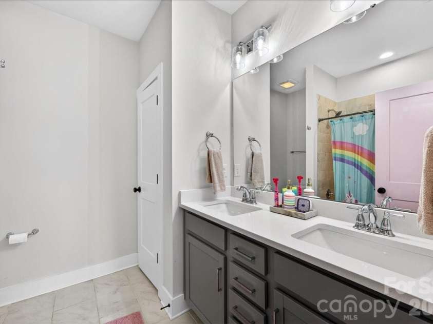 334 Armour Street, Davidson, NC 28036.  MLS# CAR4379254, YatesRealty ID 26445. Guest bathroom