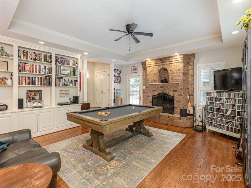 4 Silverstone Drive, Asheville, NC 28805.  MLS# CAR4280244, YatesRealty ID 26447. Built in Book Cases & Woodburning Fireplace