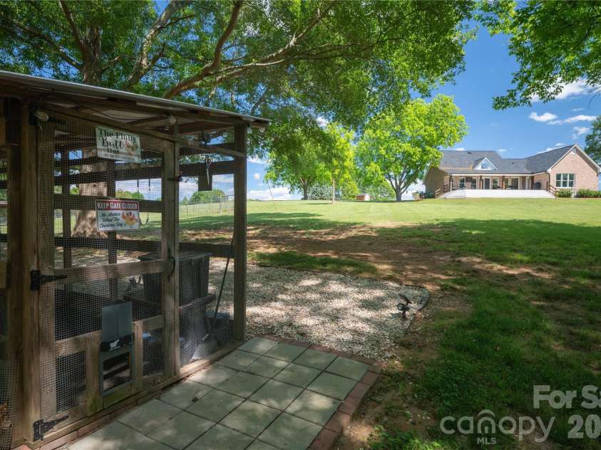 6355 Hickory Hill Lane, Stanfield, NC 28163.  MLS# CAR4381916, YatesRealty ID 26447. Chicken coop with nesting boxes