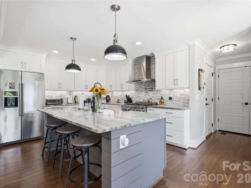 6355 Hickory Hill Lane, Stanfield, NC 28163.  MLS# CAR4381916, YatesRealty ID 26447. Dove tail, soft return cabinets, granite countertops, and updated kitchen appliances