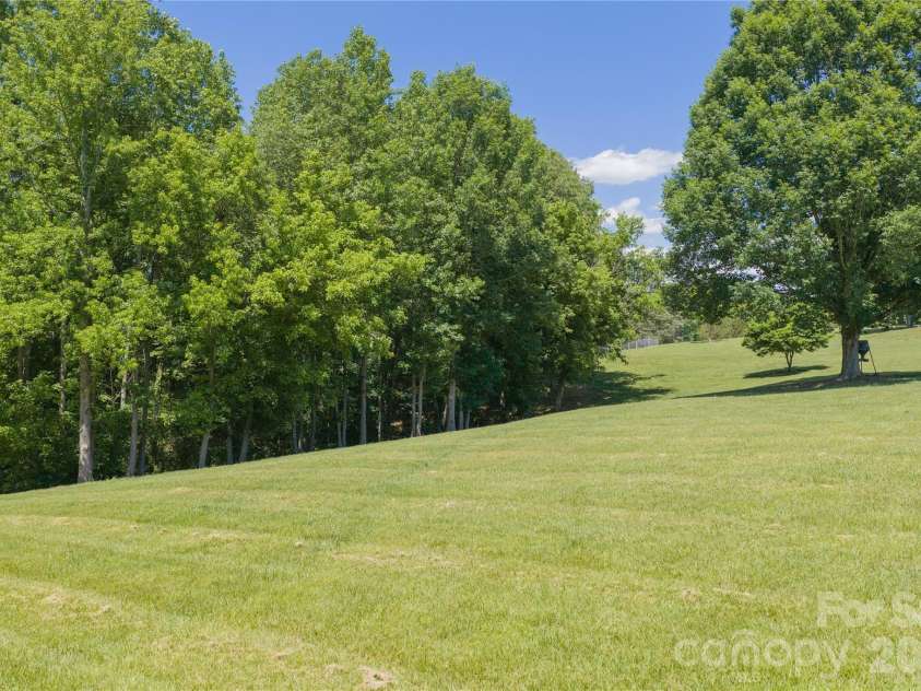 6355 Hickory Hill Lane, Stanfield, NC 28163.  MLS# CAR4381916, YatesRealty ID 26447. Open rolling pasture