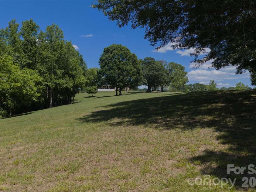 6355 Hickory Hill Lane, Stanfield, NC 28163.  MLS# CAR4381916, YatesRealty ID 26447. Open rolling pasture behind home