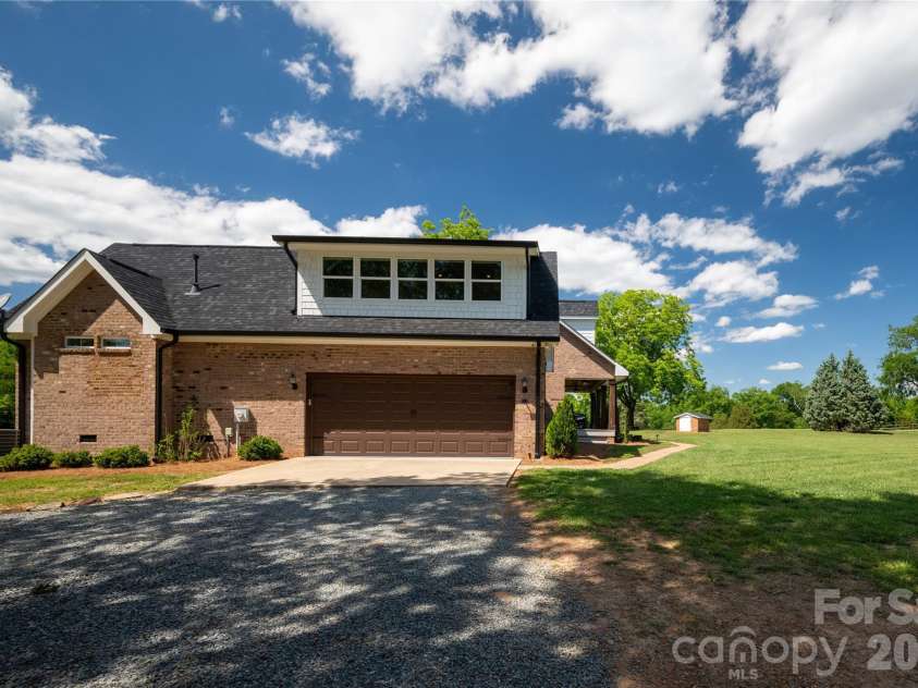 6355 Hickory Hill Lane, Stanfield, NC 28163.  MLS# CAR4381916, YatesRealty ID 26447. Oversized 1.5 car garage with keypad entry