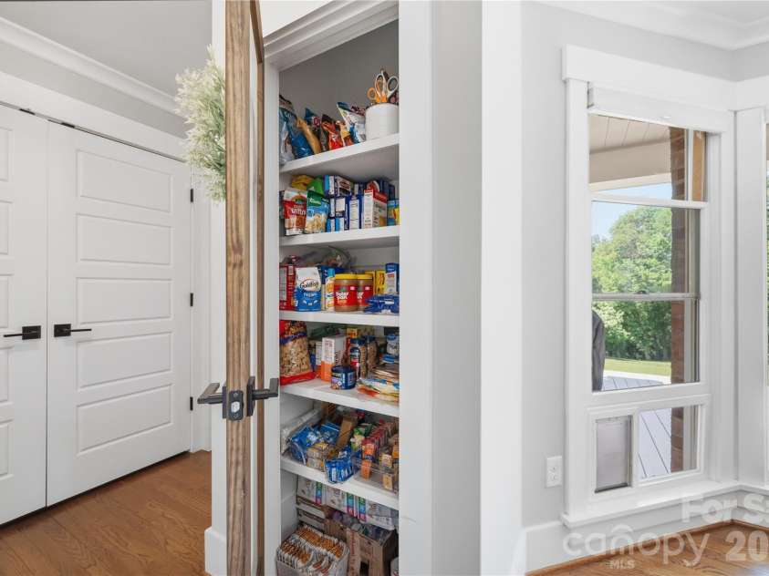 6355 Hickory Hill Lane, Stanfield, NC 28163.  MLS# CAR4381916, YatesRealty ID 26447. Pantry closet with shelving