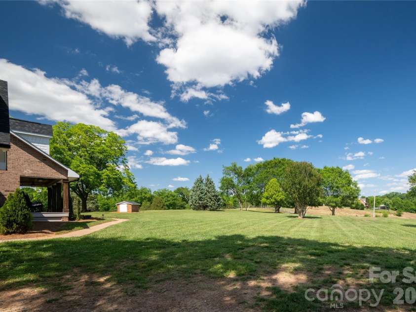 6355 Hickory Hill Lane, Stanfield, NC 28163.  MLS# CAR4381916, YatesRealty ID 26447. Private front yard provides great views from the front porch