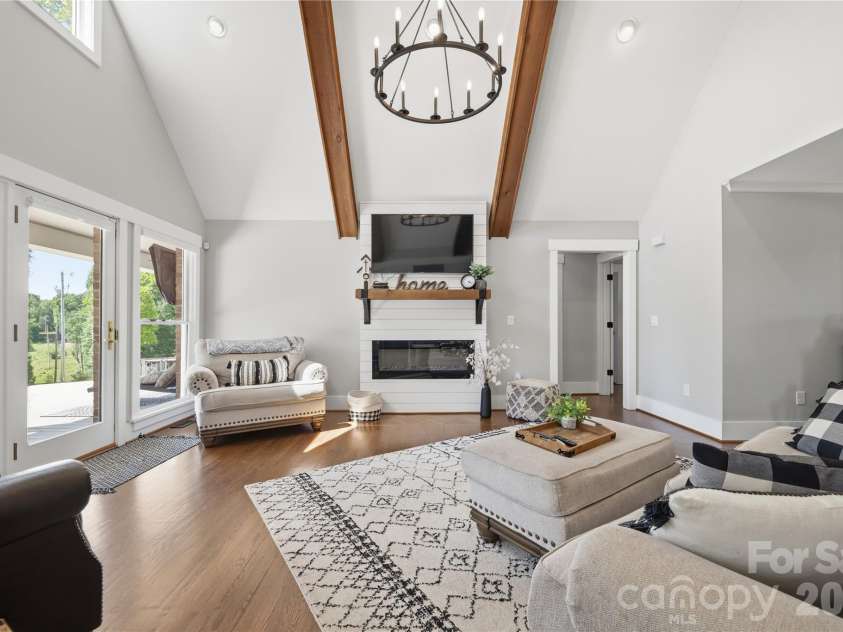 6355 Hickory Hill Lane, Stanfield, NC 28163.  MLS# CAR4381916, YatesRealty ID 26447. Wagon wheel light fixture 