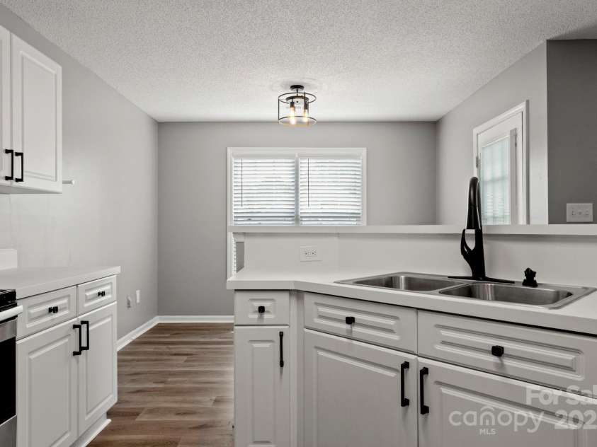 7621 Rolling Meadows Lane, Huntersville, NC 28078.  MLS# CAR4282500, YatesRealty ID 26448. NEW HARDWARE ON CABINETS AND DRAWERS
