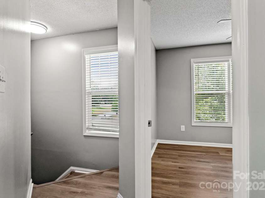 7621 Rolling Meadows Lane, Huntersville, NC 28078.  MLS# CAR4282500, YatesRealty ID 26448. NEW LVP FLOORING ON UPPER LEVEL