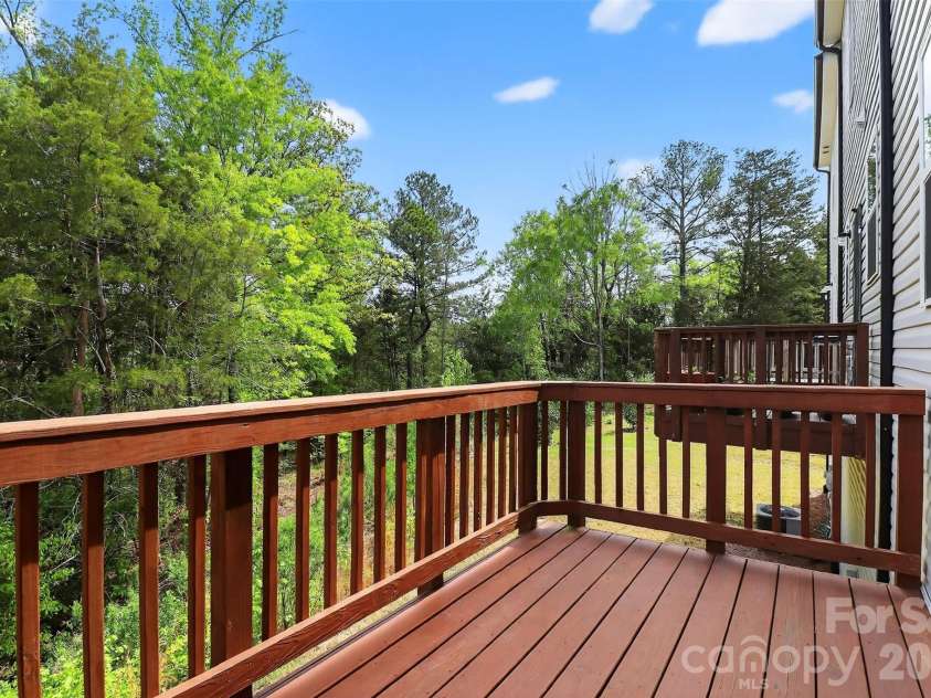 13357 Porter Creek Road, Charlotte, NC 28262.  MLS# CAR4366973, YatesRealty ID 26452. Awesome Deck overlooking woods