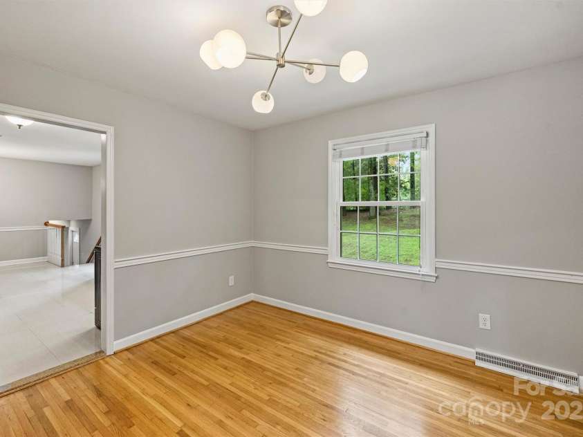 2301 Seth Thomas Road, Charlotte, NC 28210.  MLS# CAR4265395, YatesRealty ID 26452. Dining Room facing backyard