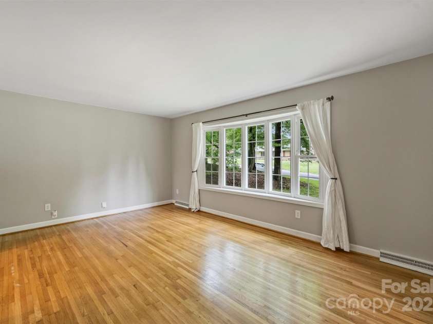 2301 Seth Thomas Road, Charlotte, NC 28210.  MLS# CAR4265395, YatesRealty ID 26452. Living Room on Main